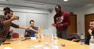 Students playing Jenga