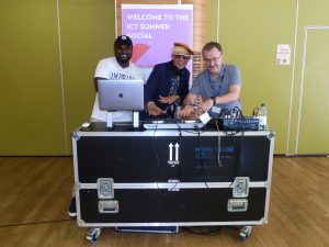 Staff DJ'ing at the party