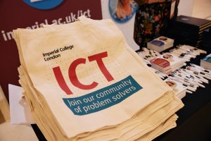 ICT merchandise includes a tote bag that says 'Join our community of problem solvers'