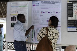 Fadil Bidmos: Scientist presenting poster of research