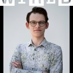 Portrait of Tomas Cermak wearing glasses and a patterned shirt, standing with arms crossed against a plain background, with WIRED Game Changers branding visible above.