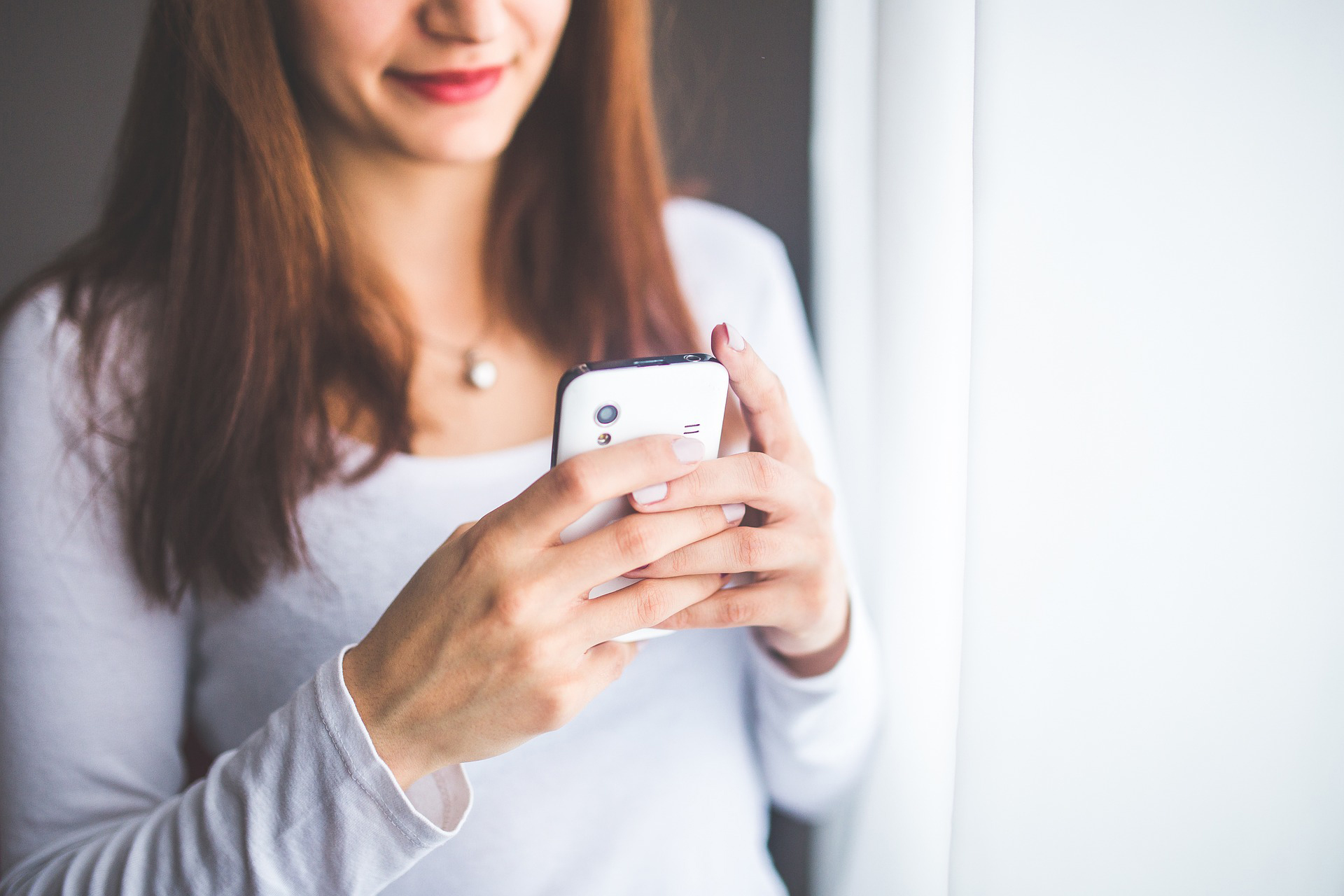 A woman using a mobile phone