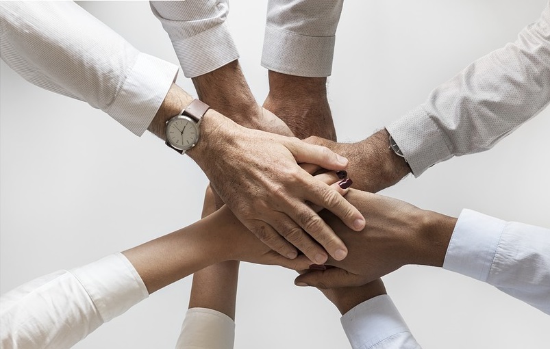 Hands together in a circle