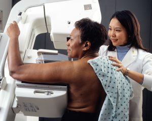 A woman being screened for breast cancer