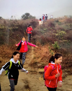 children running outdoors