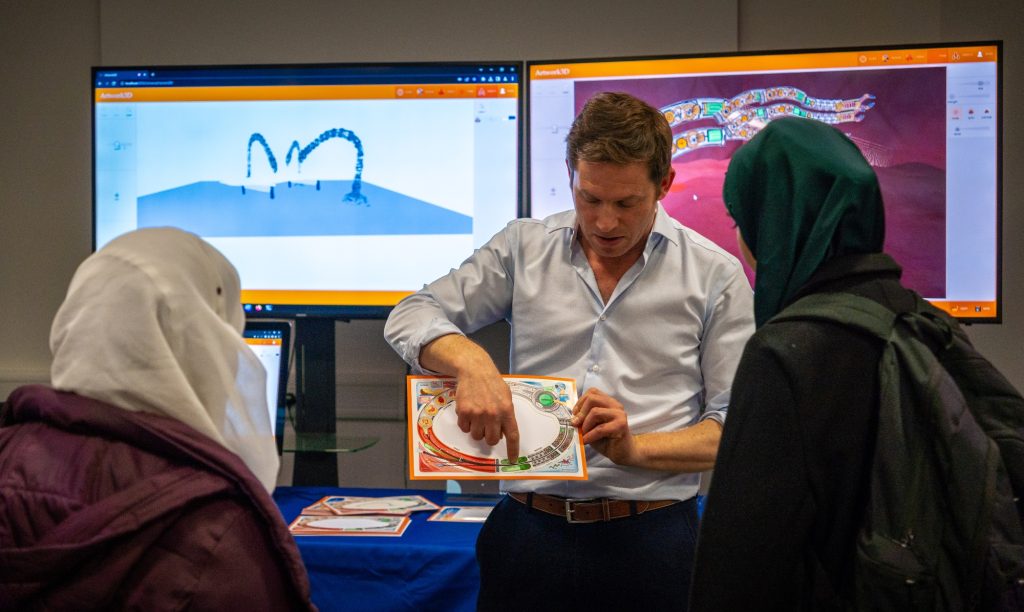 Brandon Davies briefing students on how to design a surgical robot. Credits: Rolando Charles