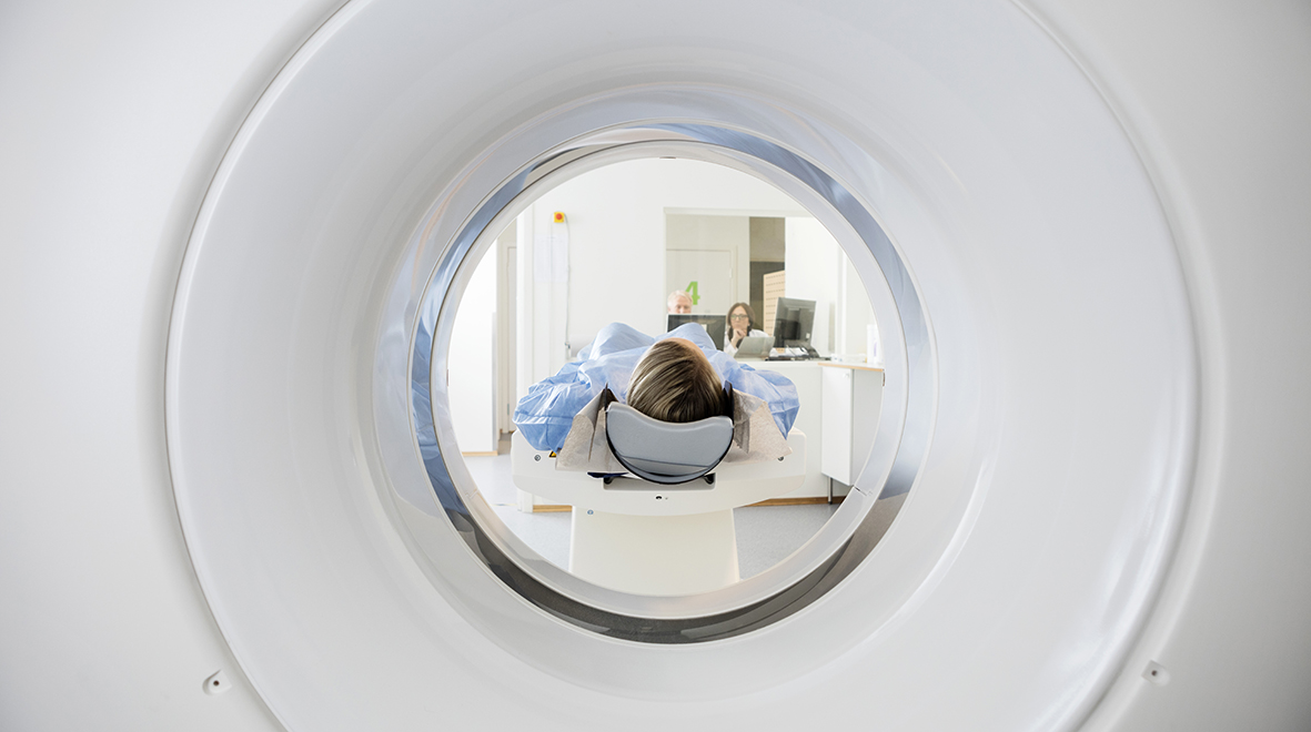 A patient undergoing a CT scan