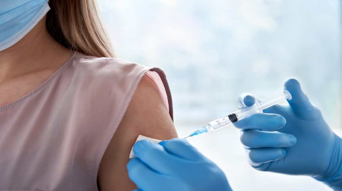 A person's arm being injected