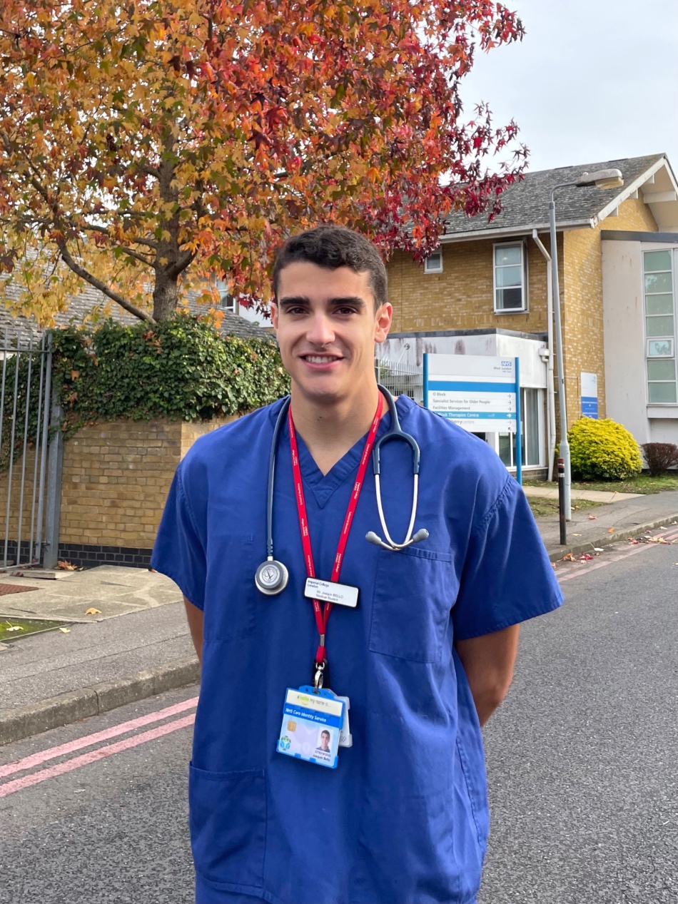 Joaquin Bello in medical scrubs