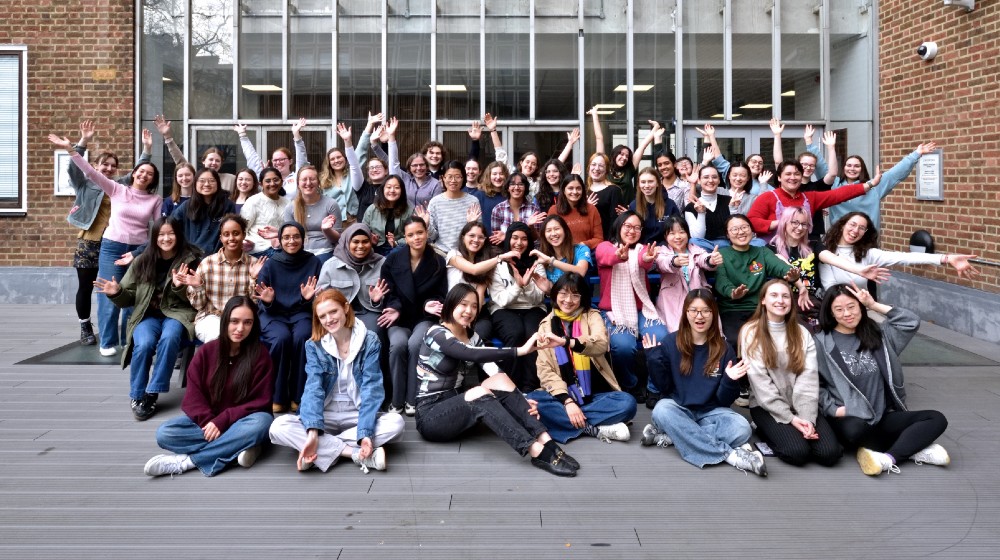 A group photo of the Society for Women and Non-Binary Individuals in Physics celebrating International Women's Day