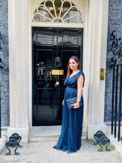 Sana in front of the door at number 10 Downing Street