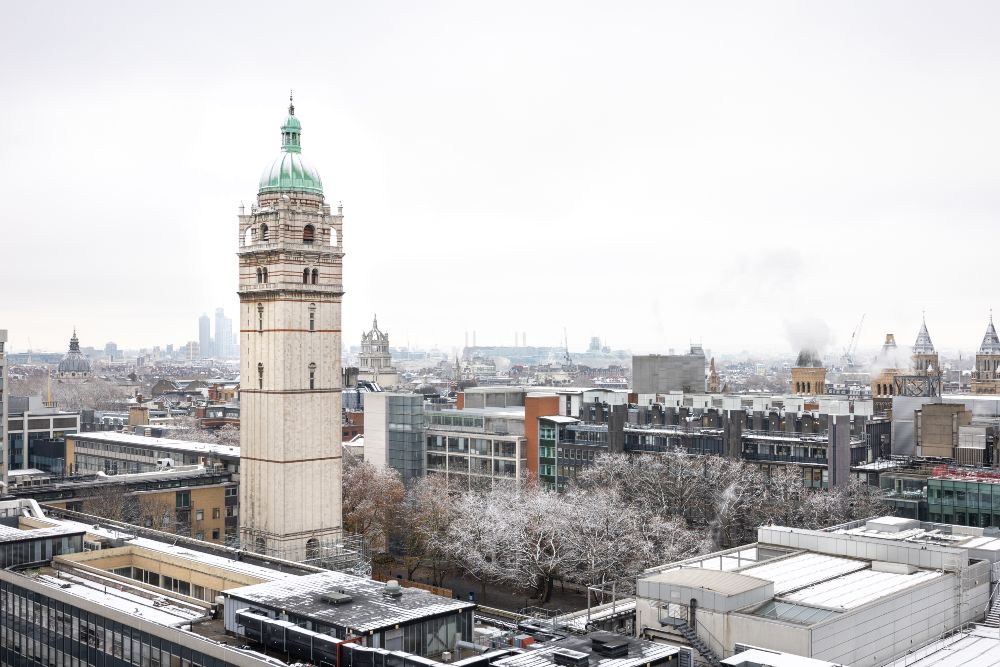 A rooftop level view southwest across Imperial College London's South Kensington campus, showing Queen's Tower and the buildings around Dangoor Plaza. 