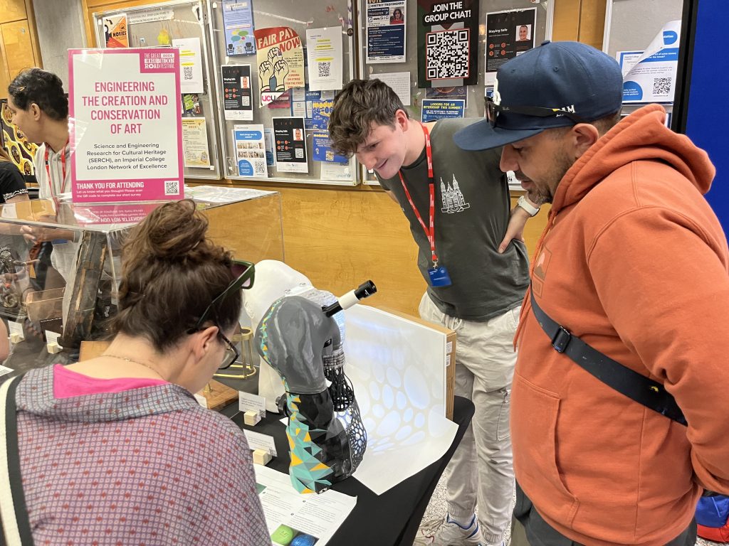 Alex Christopherson (dark green tshirt) and David Samuel (orange hoodie) were the authors of the 3D printed sculpture on the table.