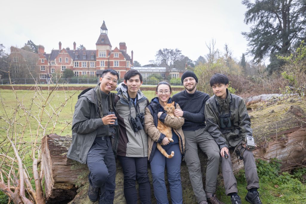 Team Silwood Snappers. From left to right: Max Khoo, Noel Chan, Corey Liu (holding Mr. Tinkles, the resident Silwood cat), Sinan Gürlek, and Hung-wei Lin.