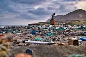 View of a beach covered by plastic garbage on the island of Santa Luzia, Cape Verde.