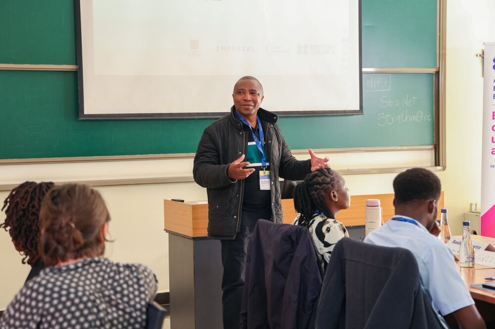 Dr Onemus Mwabonje delivering a talk to staff and students.