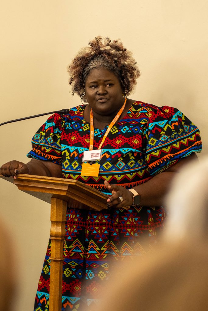 Krystal Birungi presenting at the launch of the World Malaria Report 2024 in London.