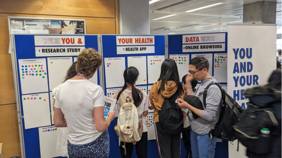 Visitors completing our interactive activity under the guidance of PERC staff member Kathryn Jones (front left)